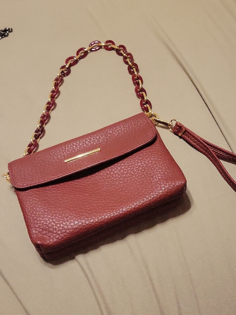 Women's Pebbled Leather Crossbody Bag in Deep Mauve